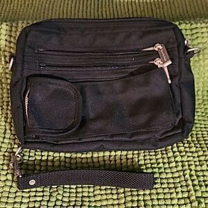 Brookstone black traveling bag wrist strap